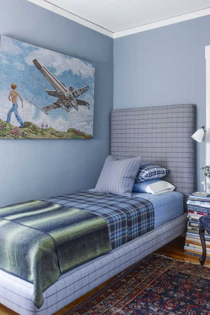 A boy's light blue bedroom
